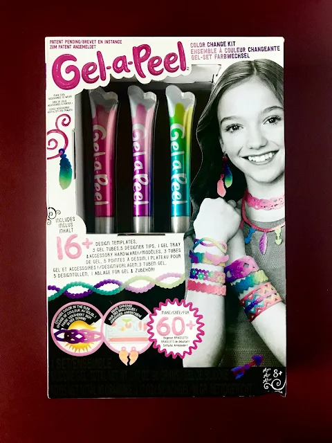 The front of the Gel-A-Peel Colour Change Kit box showing a girl with various homemade necklaces and earrings