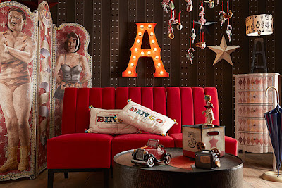 http://www.portobellostreet.es/mueble/26857/Sofa-rojo-el-mundo-del-circo