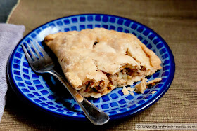 photo of a sausage and vegetable-stuffed meat pie