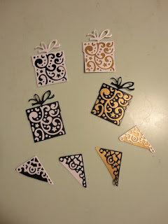 Die cut presents and corners in black, gold and pearl white