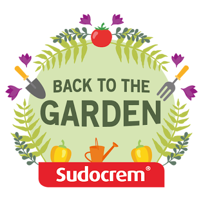 Ad | Sudocrem Back To The Garden logo with flowers and plants