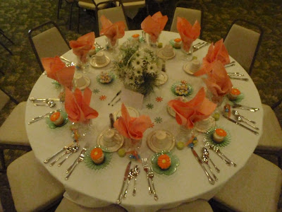green and orange daisies to scatter on the tables Jen's wedding flowers