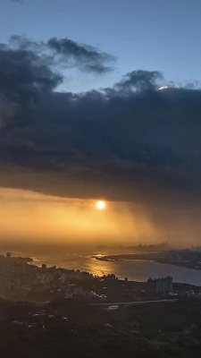 Sunset And Rain Over The City HD Wallpaper