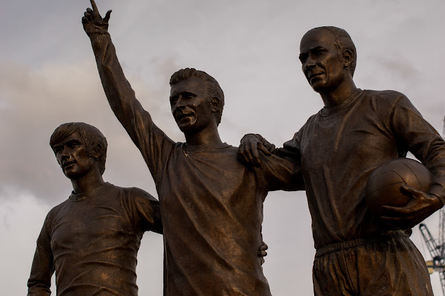 Statue of three footballers
