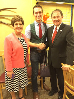 A picture of the Utah Balloon Artist with Governor Herbert of Utah