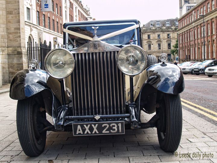 Picture of a 1934 Rolls Royce motor car being used for a wedding parked up