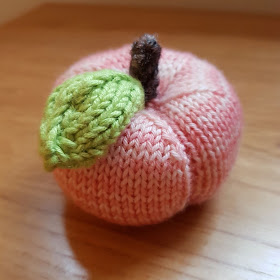 Cute little knitted peach