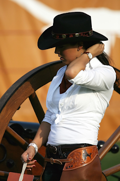 A Modern Girl Wearing Leather Chap and Stylish Hat