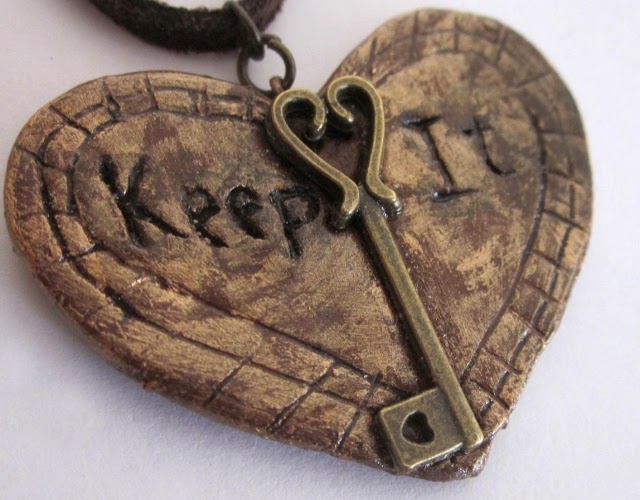 stone heart with a key