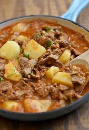 Braised beef and potatoes in tomatoes, onions, garlic, and jalapeno peppers for an easy weeknight dinner. Hearty and bold-flavored, this carne guisada is fantastic with rice! #healthy