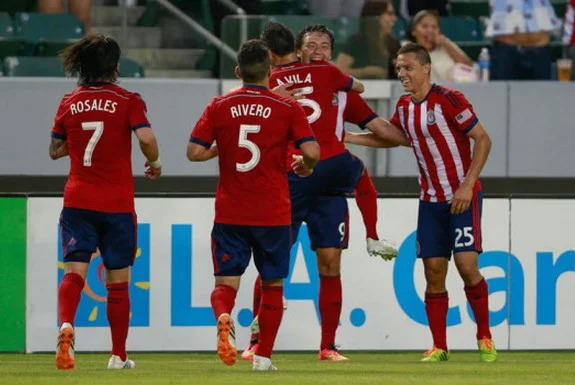 Erick Torres celebrates with Chivas USA teammates after scoring a goal against Real Salt Lake