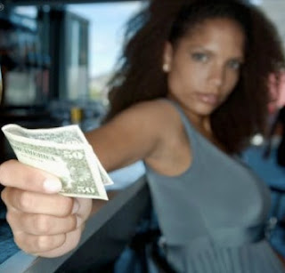 black_woman_paying_for_her_meal