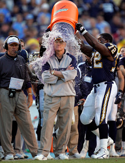 Coach Schottenheimer getting doused at the end of the game.