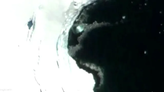 Here's a fantastic silver UFO half submerged in water in Antarctica.