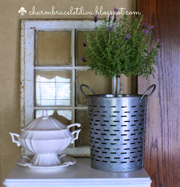 lavender topiary in an olive bucket with an ironstone soup tureen