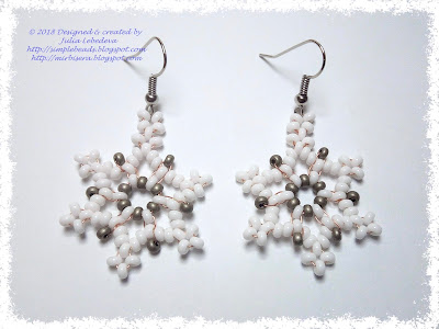 Snowflake earrings out of seed beads