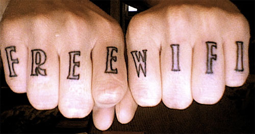 Free Wifi knuckle tattoo.