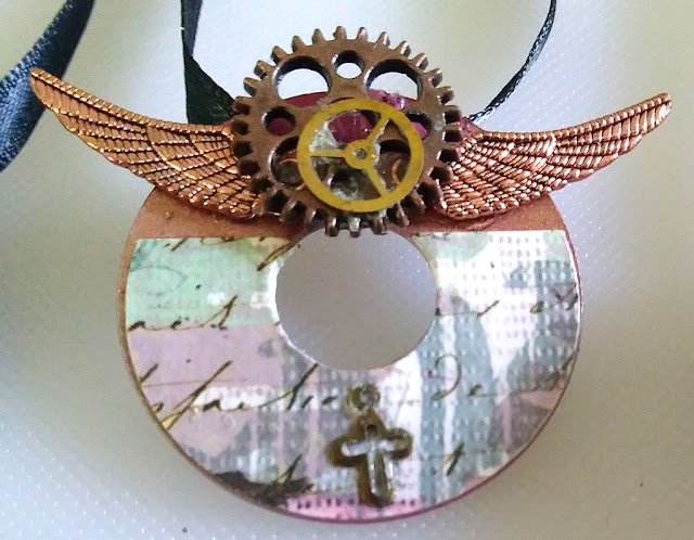 Steampunk Paper from Silhouette cameo craft cutter on metal washer jewelry necklace