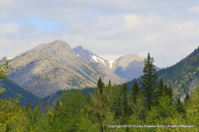 Viewing the larger peaks in the distance, there is still snow remaining in some areas.