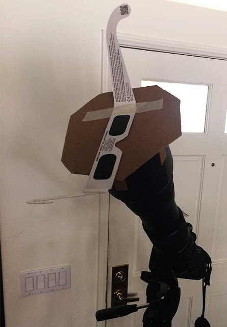 Measuring eclipse viewing glass's attenuation using cardboard fixed aperture tool (Source: Palmia Observatory)