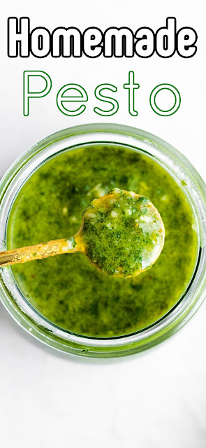 Homemade Pesto in a jar scooped by a gold spoon with a recipe title text overlay.