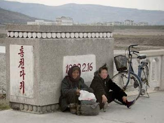 people rest on the curb