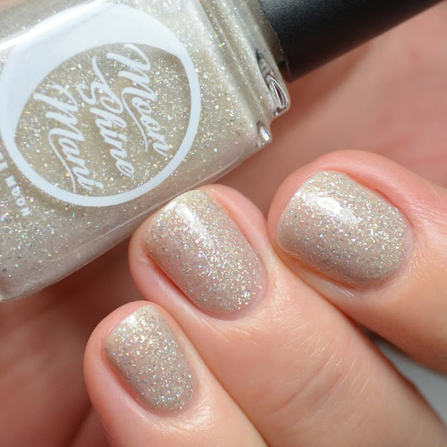 beige crelly nail polish with holographic flakies swatch