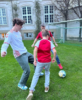Prince Christian of Denmark plays football