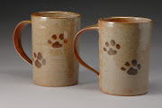 Dog's Paw Print Mugs. My Jack Russell, named Fish, decorates mugs. (photo )