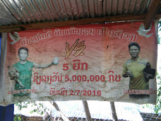 A old Cockfight advertisement in the "Cockfight Stadium" in Vang Vieng in Laos.