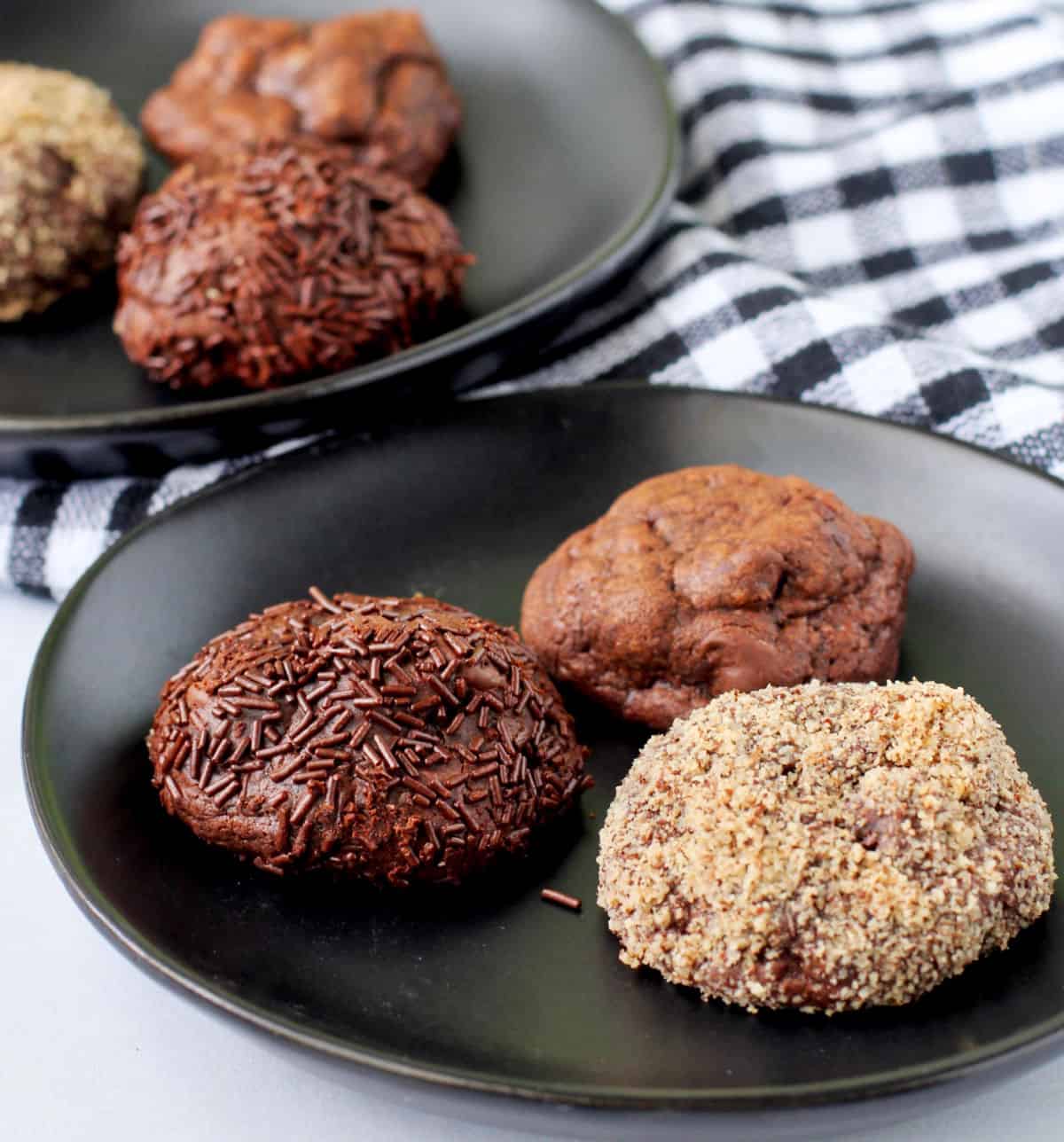 Three kinds of Chocolate Truffle Cookies on black plates.