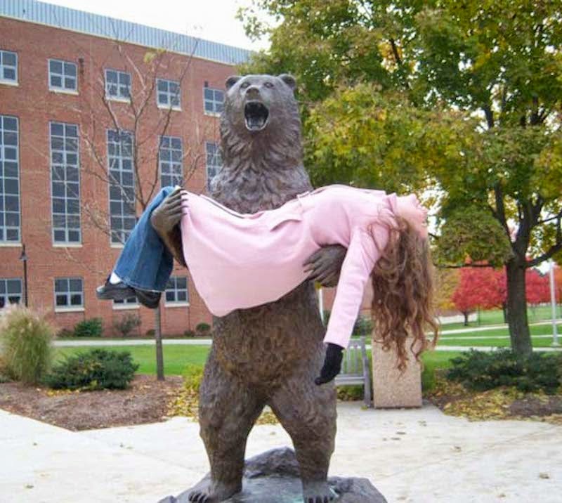 3. Don’t let her pink coat fool you, this chick is brave, and beary trusting of local wildlife! - 23 Times Pedestrians Messed With Statues...And It Was Downright Hilarious