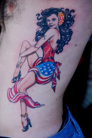 Sailor pin-up girl tattoo. Related Tattoos: Dolphin Tattoos, Shark Tattoos,