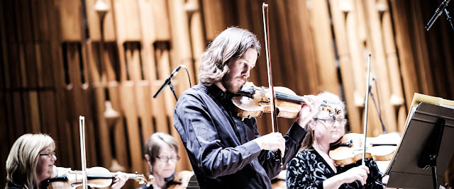 Thomas Gould leads Britten Sinfonia in concert at the Barbican (photo Thomas Skosvende)