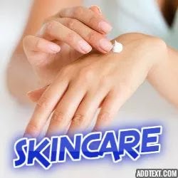 skincare. A female is at hand, applying lotion for skin care