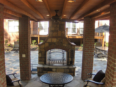 oversized backyard fireplace waterfall