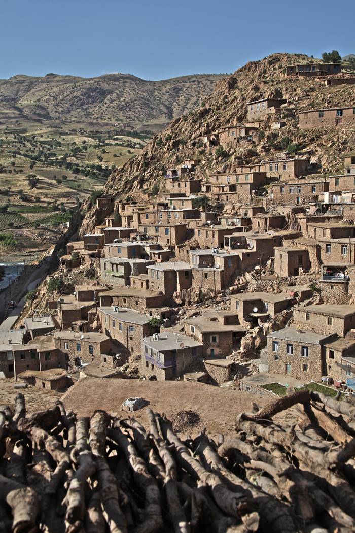 Palangan (meaning leopards in Persian) is a village located 47 kilometers north-west of Kamyaran in Iran's Kurdestan province. This village is spread over both sides of a valley. All of the houses are made of stone and like a staircase they are in a continuous pattern, i.e. the roof of one house is the yard of another house. This village is one of the most beautiful villages of the province not only because of its unique architecture, but also because of its beautiful nature. It is located beside a river which flows into the Sirwan River. This area was one of the important regions of Kurdistan from Saljooqi period on and Palangan Castle which is next to the village over a mountain bears witness to this claim. (source: Islamic Republic of Iran's Minister of Interior)