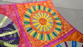 Open weaving circle quilt using Island Batik fabrics