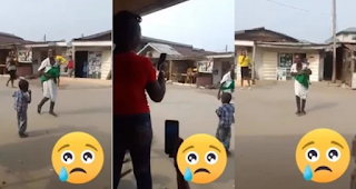 Watch moment mother of two storm the street to sing about Nigeria Situation [video]