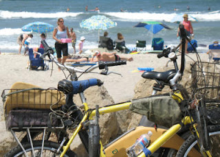 Bike power at the beach with a shimmering simmering backdrop