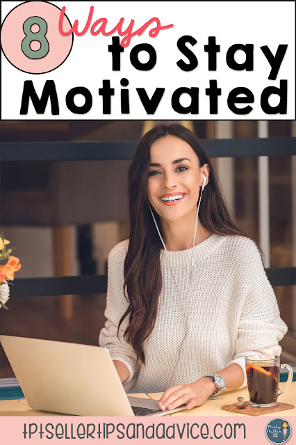 8 Ways to Stay Motivated, woman at coffee shop smiling while on her laptop