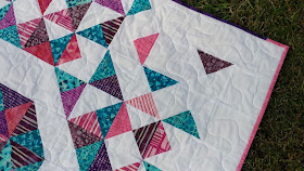 Heart quilt with quarter square triangles