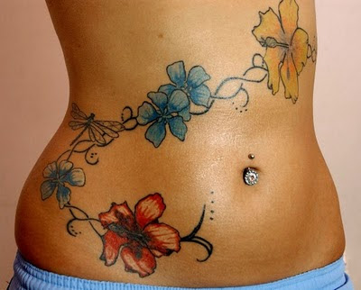 2. Beautiful Stylish Women Stomach Tattoos Designs
