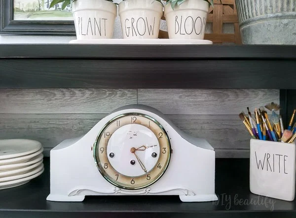 painted mantle clock on display
