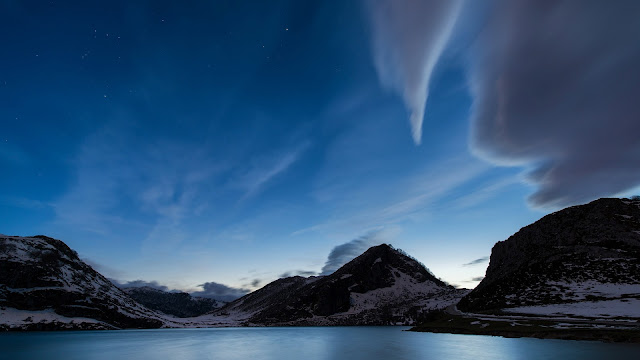 Spain Asturias bay mountains snow dusk blue sky HD Wallpaper