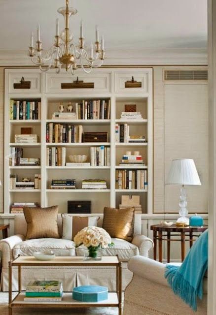 living room with built in bookcases