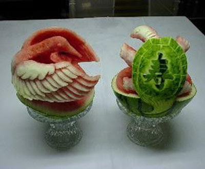 Watermelon carving art - seen at curiousphotos.blogspot.com