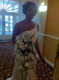 Traditional bridal bouquet cascade of white and cream flowers by Stein Your Florist Co.