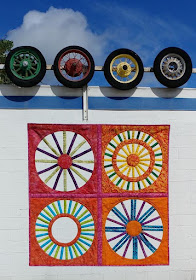 Open weaving circle quilt using Island Batik fabrics