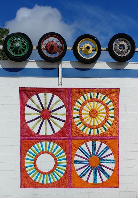 Open weaving circle quilt using Island Batik fabrics